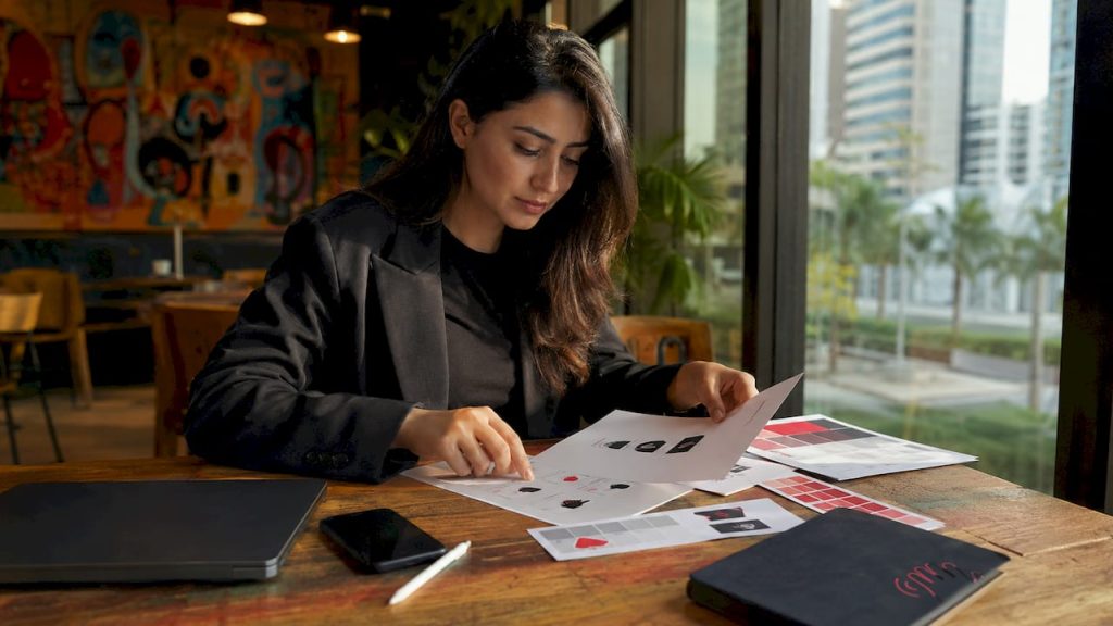 Consultant reviewing brand strategy documents