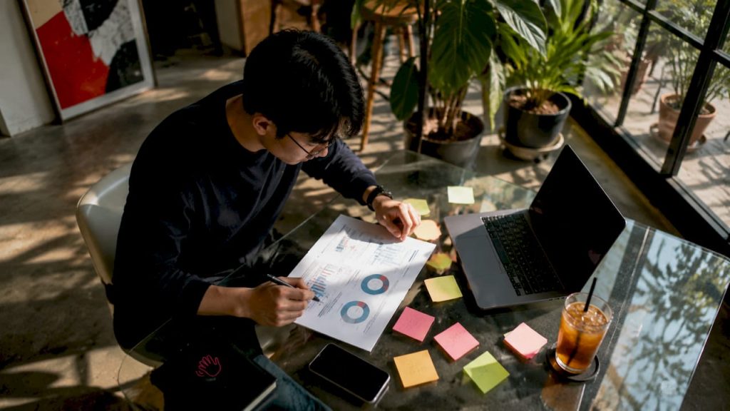 Marketing professional reviewing strategy plan